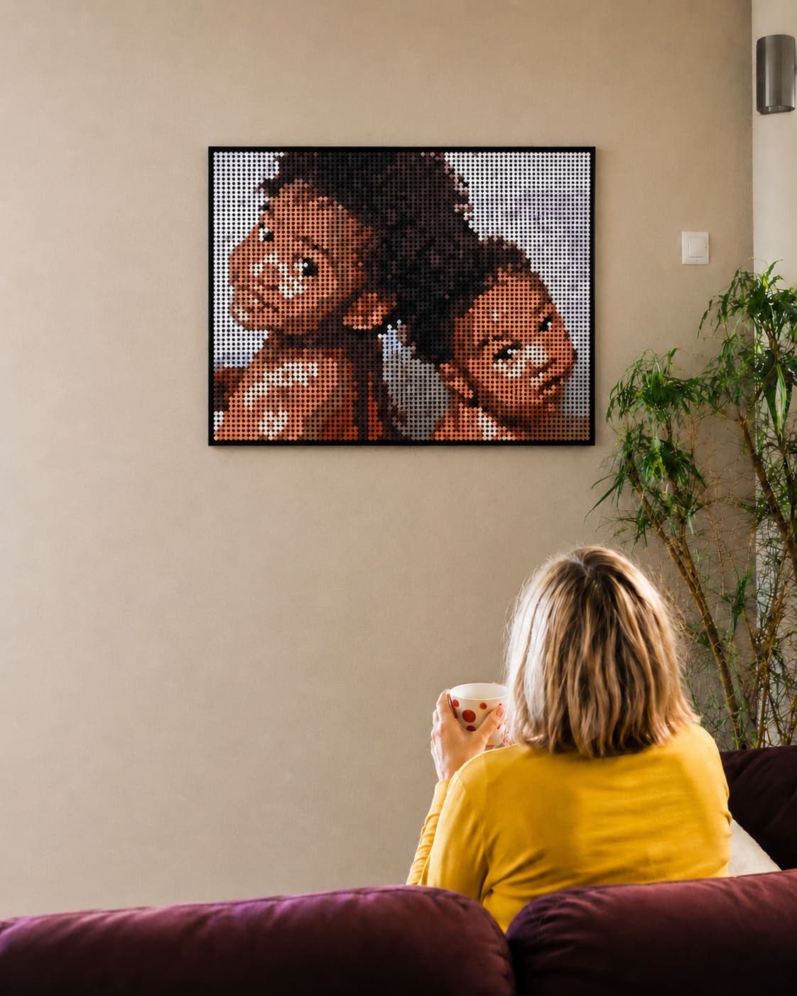 Tableau pixel art MonPixel accroché au mur